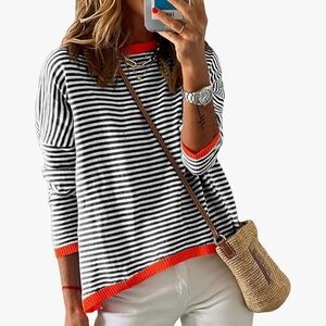Striped Black and White Top with Red Accents